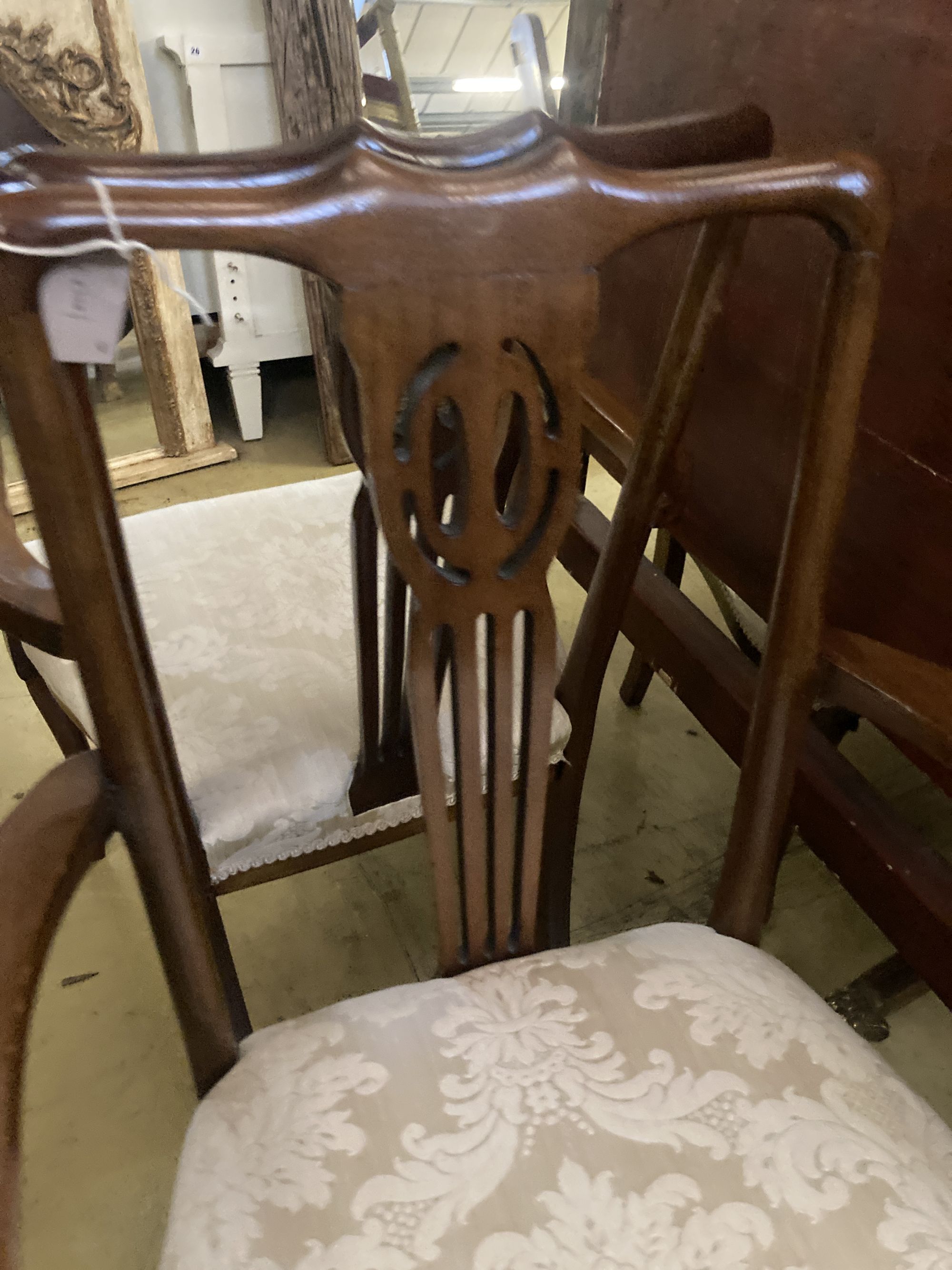 A set of eight Edwardian mahogany dining chairs (two with arms)